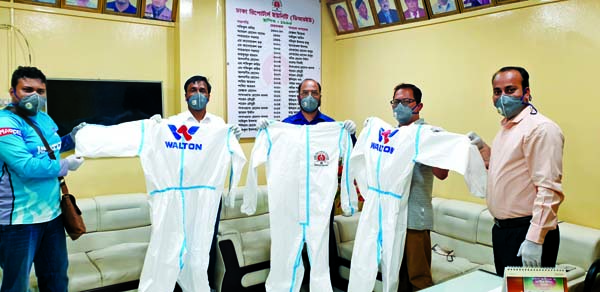 Udoy Hakim, Executive Director of Walton Group, handed over the first consignment of Personal Protective Equipment (PPE) for protecting the volunteer's dealing with the COVID-19 patients to Rafiqul Islam Azad, President and Reaz Chowdhury, General Secret