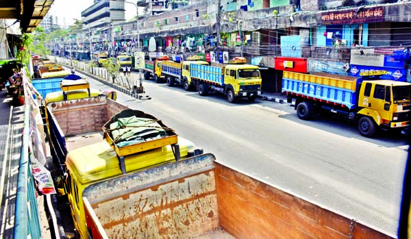 Trucks remain idle due to closure of mass transport plying for coronavirus. The snap was taken from the city's Swamibagh area on Saturday.