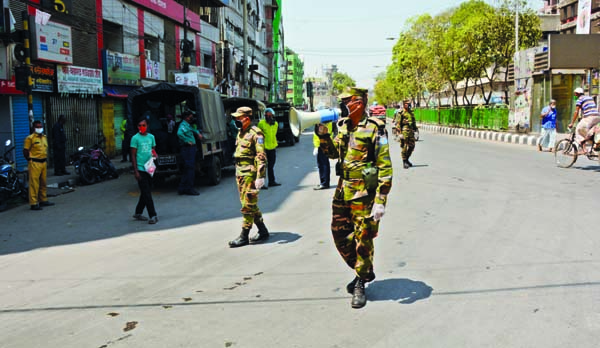 Army personnel conducting awareness build-up miking against coronavirus in city's English Road area on Sunday.