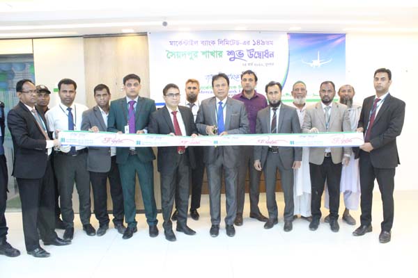 : A S M Zakir Hossain, Senior Vice President & Zonal Head of North Bengal Region of Mercantile Bank Limited, inaugurating the bank's 149th branch at Syedpur in Nilphamari by cutting ribbon on Wednesday. Md Mamunur Rashid, Vice President and Head of Dinaj