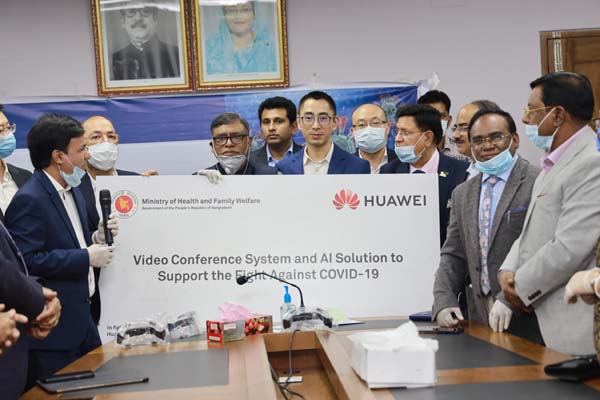 Zhang Zhengjun, CEO of Huawei Technologies (Bangladesh) Limited, handing over the video conference systems and AI solution to Health and Family Welfare Minister Zahid Maleque aimed to help the fight of people of Bangladesh against COVID-19 at the office o