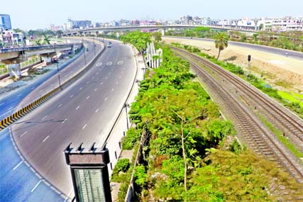 Roads stretching to Dhaka Airport look deserted on Tuesday due to the suspension of transport services in Dhaka and across the country to contain spread of coronavirus.