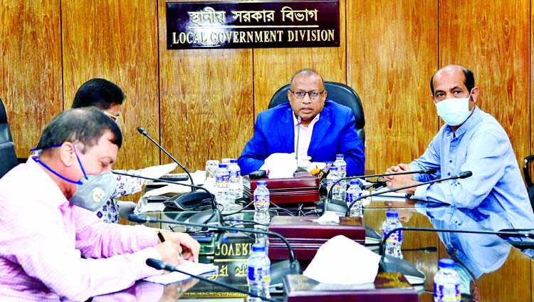 Local Government Minister Tajul Islam presiding over the inter-ministerial meeting in resisting dengue at his office on Thursday.