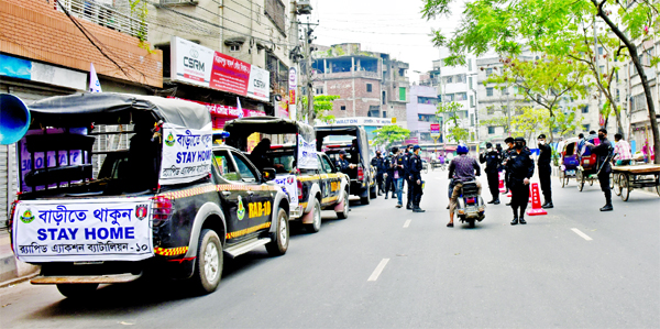 Members of RAB-10 are on alert to prevent commoners from roaming on the streets. The snap was taken from the city's Dholaikhal area on Wednesday.