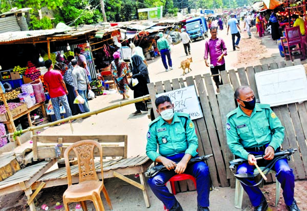 The road to the city's AGB Colony was closed due to coronavirus. Law-enforcers remain alert nearby. The snap was taken on Monday.