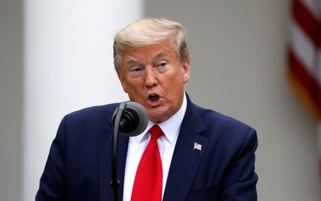 S President Donald Trump addresses the daily coronavirus task force briefing in the Rose Garden at the White House in Washington, US, April 14, 2020. REUTERS