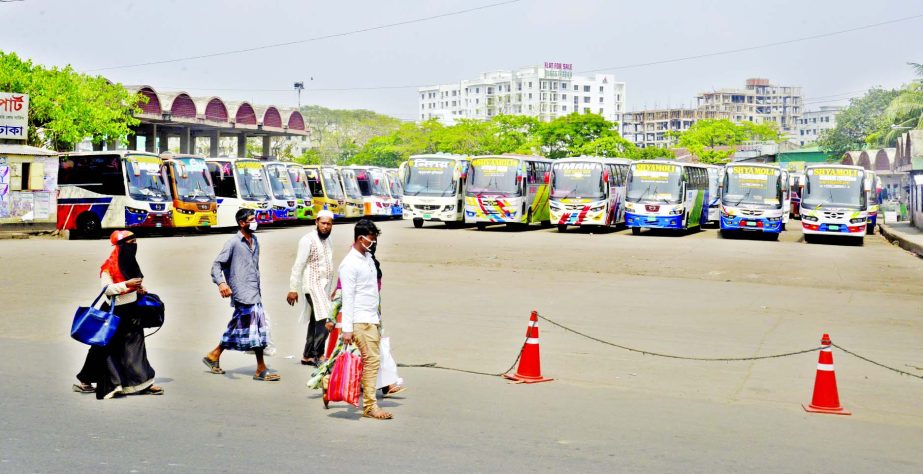Hundreds of buses remain stranded at Mohakhali Bus Terminal in Dhaka on Friday following suspension of transport services by the government to prevent outbreak of coronavirus across the country.