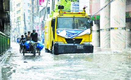 Many streets were inundated by rain water due to lack of adequate drainage system. This picture was taken from Mouchak area on Thursday.