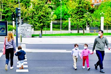 Children walking in Madrid after the government allowed kids out for the first time in six weeks.