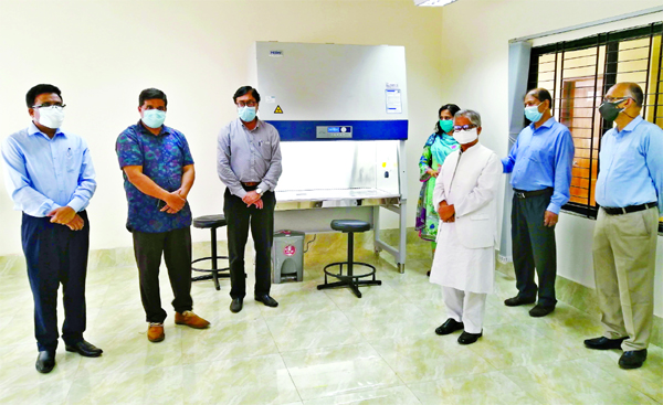 Vice-Chancellor of Dhaka University Prof Dr Md Akhtaruzzaman, among others, at the inaugural ceremony of COVID-19 Test Laboratory at the Center of Advanced Research in Sciences Bhaban of the University on Tuesday.