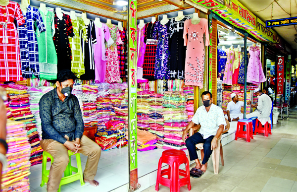 A market wears a deserted look as no customers turned up at a market despite opened by the shop owners. This picture was taken from city's Keraniganj on Saturday.