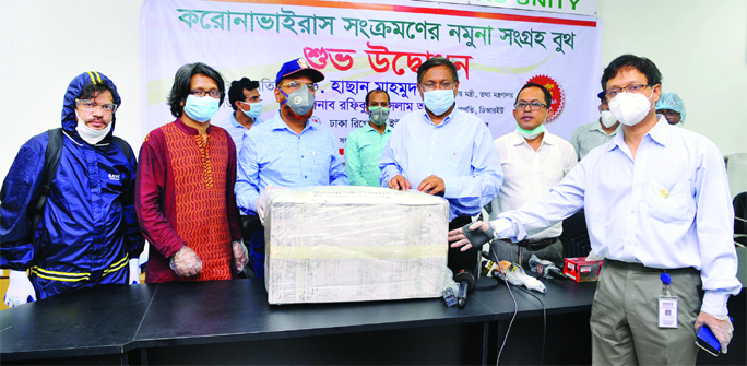 Information Minister Dr Hasan Mahmud inaugurating the booth for the collection of specimen of coronavirus infection at Dhaka Reporters Unity on Monday.