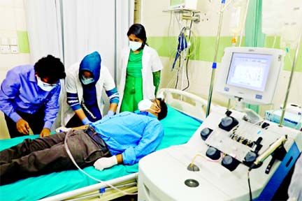 Medics collect plasma for the first time in the country from the body of a coronavirus survivor physician at Dhaka Medical College Hospital (DMCH) on Saturday.
