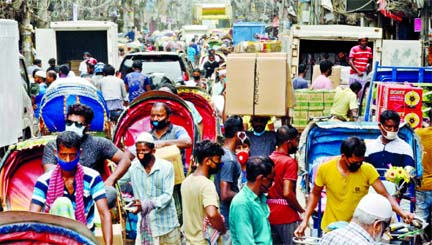 The Nabwabpur road in Dhaka remains packed like ordinary days on Tuesday despite the nationwide shutdown over the coronavirus outbreak.