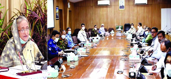 Prime Minister Sheikh Hasina speaking at a meeting of the National Disaster Management Council from her official residence Ganabhaban through video-conference on Wednesday to review the preparations to face cyclone Amphan. BSS photo
