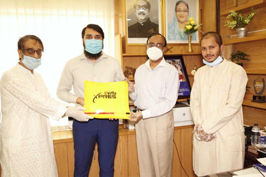 Atiqur Rahman, Director of Evaly, handing over healthcare materials to Tabarak Ullah, Additional DIG of 999, at its head office in the city recently.