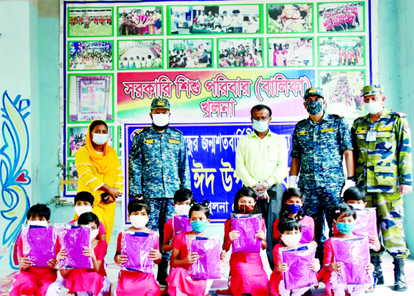 Bangladesh Navy personnel distributing Eid gifts among the orphan children in Khulna on Friday in observance of the birth centenary of Father of the Nation Bangabandhu Sheikh Mujibur Rahman.