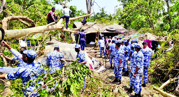 Members of Bangladesh Air Force engaged in removing uprooted and broken trees in the cyclone Amphan-hit areas. The snap was taken from Bhasanchar, Patuakhali on Friday.