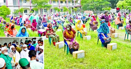 Abu Ahmed Mannafi, Dhaka South City unit President of Bangladesh Awami League, distributing Prime Minister's gift packets among the people hit hard by coronavirus shutdown at Sher-E-Bangla Railway School in Kamlapur, Dhaka on Friday. Mazharul Islam Sentu