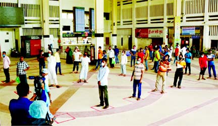 People throng the Kamlapur Railway Station in Dhaka for tickets on Saturday as eight intercity trains starts operations from today (Sunday). But they return empty handed as the authorities decided to sell tickets online to ensure health safety of passenge