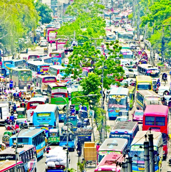 Roads and streets in Dhaka witnessed heavy traffic congestion on Thursday morning as public transport services resumed recently in the capital after months long nationwide shutdown. This photo was taken from Gulistan area.