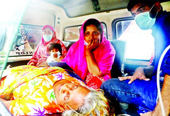 Anxious faces inside an ambulance appear after an ailing woman denied admission at several hospitals in Dhaka on Friday. This photo was taken from the National Neurology Hospital.