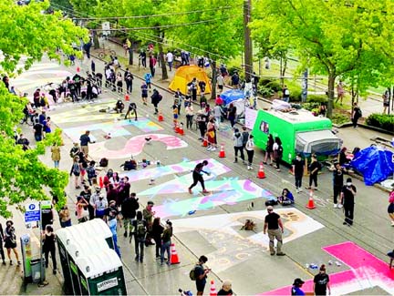 People create a Black Lives Matter mural on a street of Seattle, Washington, US, on Thursday. AFP photo