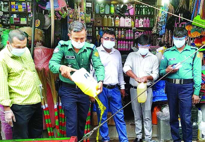 Consumers Rights Protection Department under the Ministry of Finance seized huge quantity of date expired sanitizer and medical equipment by conducting raid at different shops. The snap was taken from the city's Kawran Bazar on Saturday.