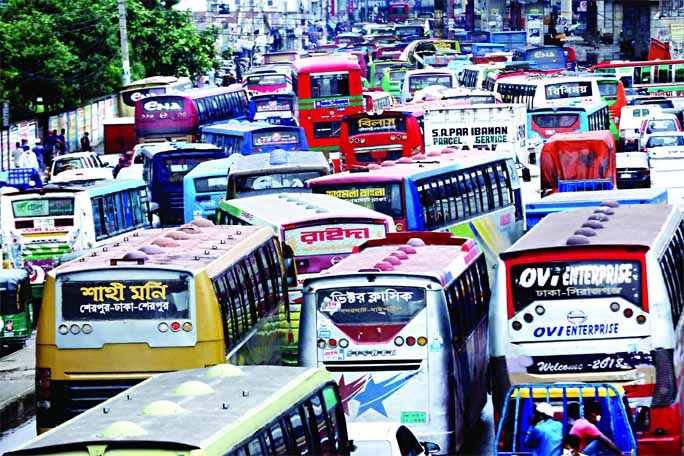 Traffic jam was created in the city's North Azampur area on Saturday due to haphazard movement of passenger buses.