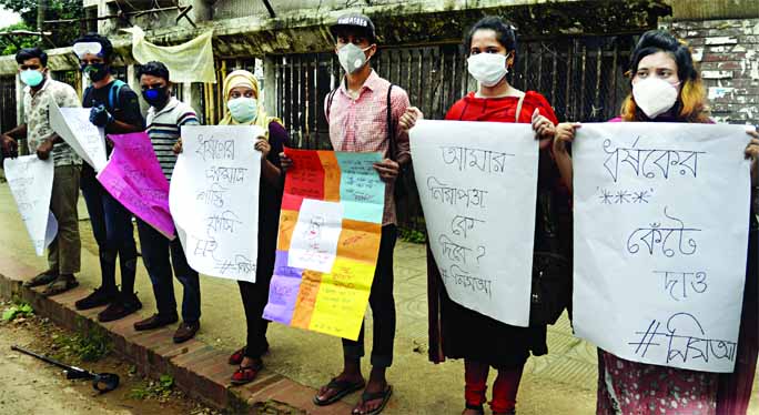 'Nirapad Sarak Andolon' formed a human chain in front of the Jatiya Press Club on Monday to realize its various demands including security of women.