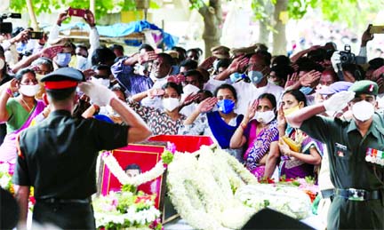 Indian army soldiers and family members pay tribute to Colonel Santosh Babu during a funeral at his hometown Suryapet, India on Thursday.