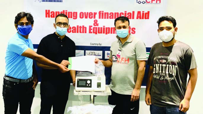 Tanvir Shahriar Rimon, Founder of Connect the Dots, handing over respiratory equipment to Bidyut Barua, Founder of the Chattogram Field Hospital on Thursday.