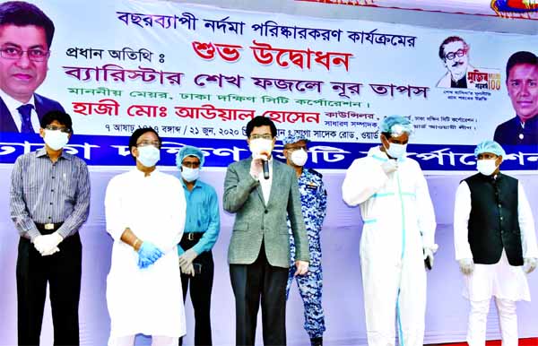 Mayor of Dhaka South City Corporation Barrister Fazle Noor Taposh speaks at the function organised by DSCC after being inaugurated yearlong drain cleaning programme at Aga Sadeq Road in the city on Sunday.