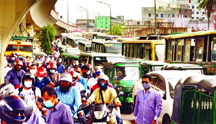 Large number of vehicles get stuck in traffic jam under the Mayor Hanif Flyover at Gulistan as the capital city returns to its old shape after more than two months of nationwide shutdown.