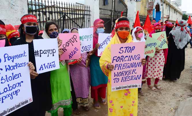 Sammilita Garments Sramik Federation formed a human chain in the city's Topkhana Road on Friday in protest against retrenchment of workers in excuse of coronavirus.