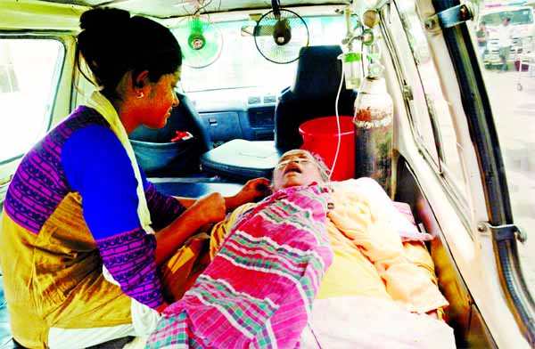 Relatives take back a patient with liver disease from Dhaka Medical College and Hospital by an ambulance on Friday after she is being denied admission in the hospital.