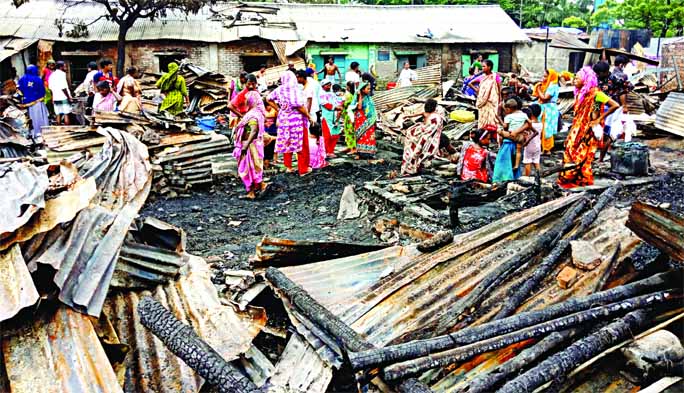 A view of Kamalapur TT Para after fire burnt about fifty shanties on Saturday. The miseries of the poor people know no bounds.