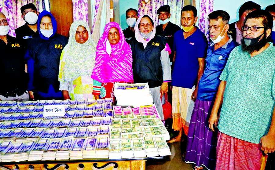 RAB arrests six people with huge currency notes from the capitalâ€™s Mirpur-12 on Monday.