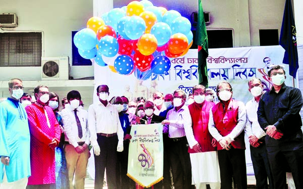 Vice-Chancello of Dhaka University Prof Dr Akhtaruzzaman inaugurates the 99th founding anniversary programme of the university by releasing balloons in front of Senate Bhaban of the university on Wednesday.