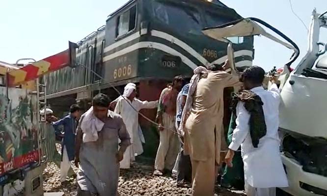 A mini-bus collided with a train in Pakistan's Punjab province on Friday.