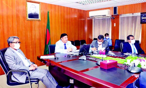 Foreign Minister Dr AK Abdul Momen presides over a virtual meeting with former diplomats at the seminar room of the Ministry on Friday with a view to addressing global challenges due to Covid-19 pandemic.