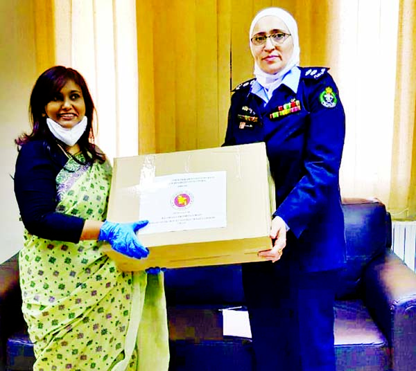 Nahida Sobhan, Bangladesh Ambassador to Jordan, hands over necessary utensils to Dalal Sawyalha, Director of Amman's Joyaideh Rehabilitation Center, where a total of 103 Bangladeshi female detainees are living now after their arrest on various offences.