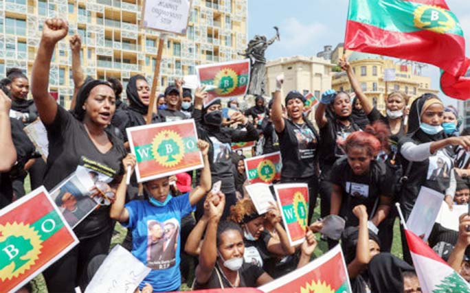 Members of the Oromo Ethiopian community in Lebanon take part in a demonstration to protest the death of musician and activist Hachalu Hundessa, in the capital Beirut on Tuesday.