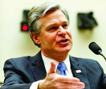 FBI Director Christopher Wray, pictured in February, described a wide-ranging campaign by the Chinese government to disrupt US life.