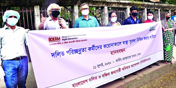 Bangladesh Dalit and Excluded Rights Movement forms a human chain in front of the Jatiya Press Club on Saturday with a call to ensure health protection for Dalit conservancies during corona pandemic.