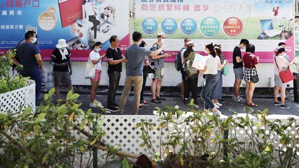 People queue to vote in Hong Kong primary election to choose pro-democracy candidates. Internet