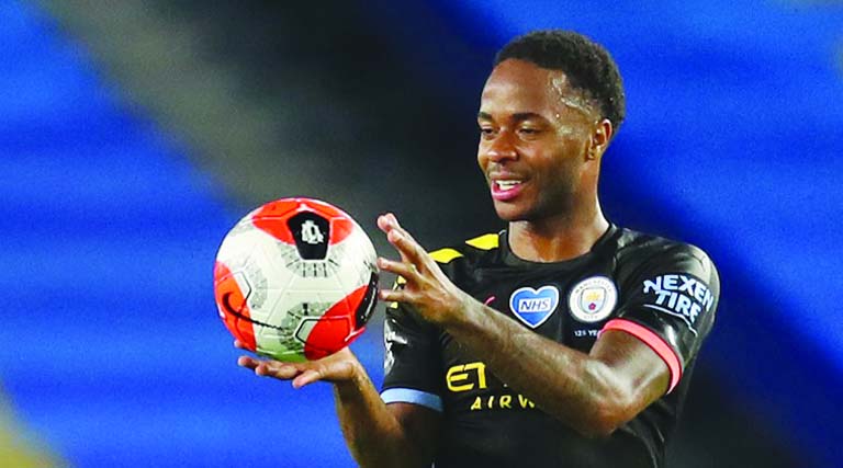 Manchester City's Raheem Sterling with the matchball after scoring a hat-trick against Brighton at the AmEx Stadium in the Premier League on Saturday.