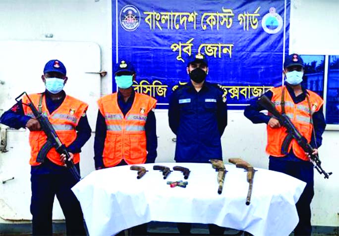 Acting on a tip-off, members of Coastguard recovered 5 locally made arms along with bullets conducting raid at East Vitar Channel under Sonadia Island in Cox's Bazar district on Sunday.
