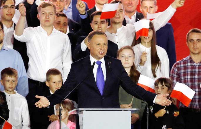 Polish President and Presidential candidate of the Law and Justice (PiS) party Andrzej Duda speaks after the announcement of the first exit poll results on the second round of the Presidential election in Pultusk, Poland on Sunday.