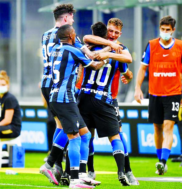 FC Inter's Lautaro Martinez (3rd right) celebrates his goal with teammates during an Italian Serie A football match between FC Inter and Torino in Milan, Italy on Monday.